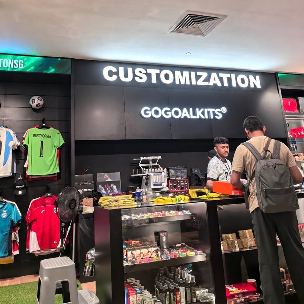 Custom soccer jersey with personalized name and badge